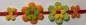 Stoff-Filz Blume Grandiosa, grün mit weissen Tupfen